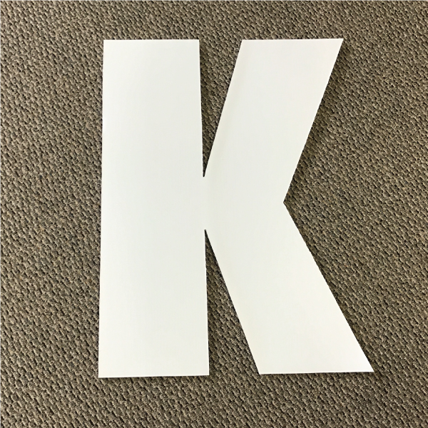 letter-k-white-yard-greeting-card-sign-happy-birthday-over-the-hill-plastic
