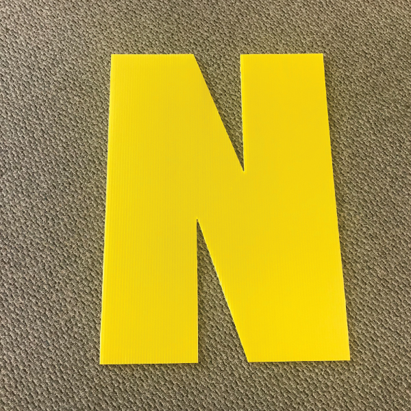 letter-n-yellow-yard-greeting-card-sign-happy-birthday-over-the-hill-plastic