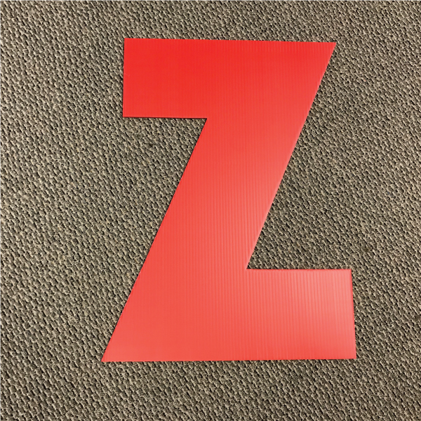 letter-z-red-yard-greeting-card-sign-happy-birthday-over-the-hill-plastic